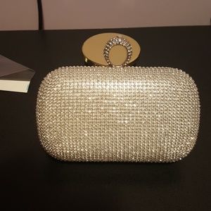 Silver studded evening clutch